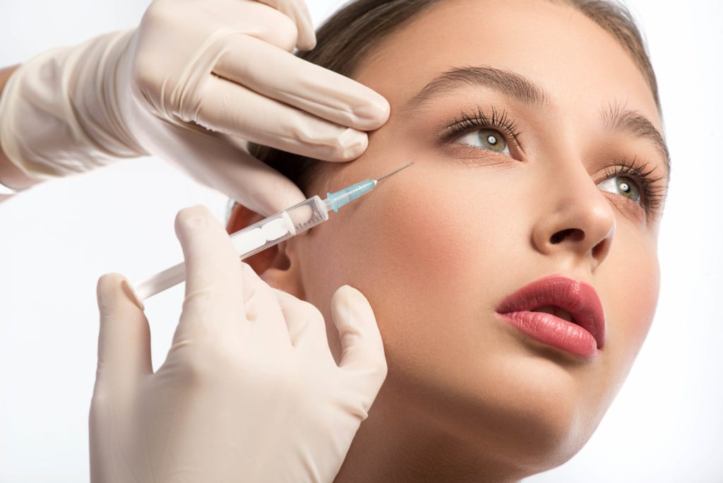 Woman Taking Botox Injection | Bare N Beautiful in Anderson, SC