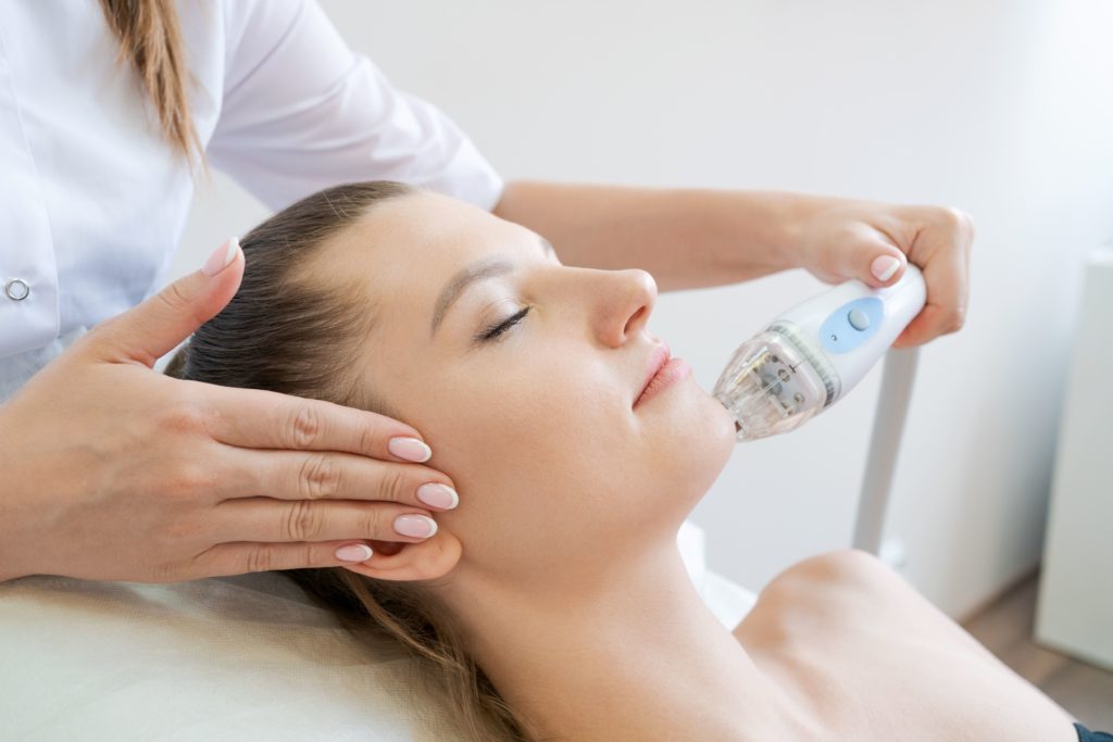 Portfolio 6 Woman Taking RF Microneedling Treatment | Bare N Beautiful in Anderson, SC